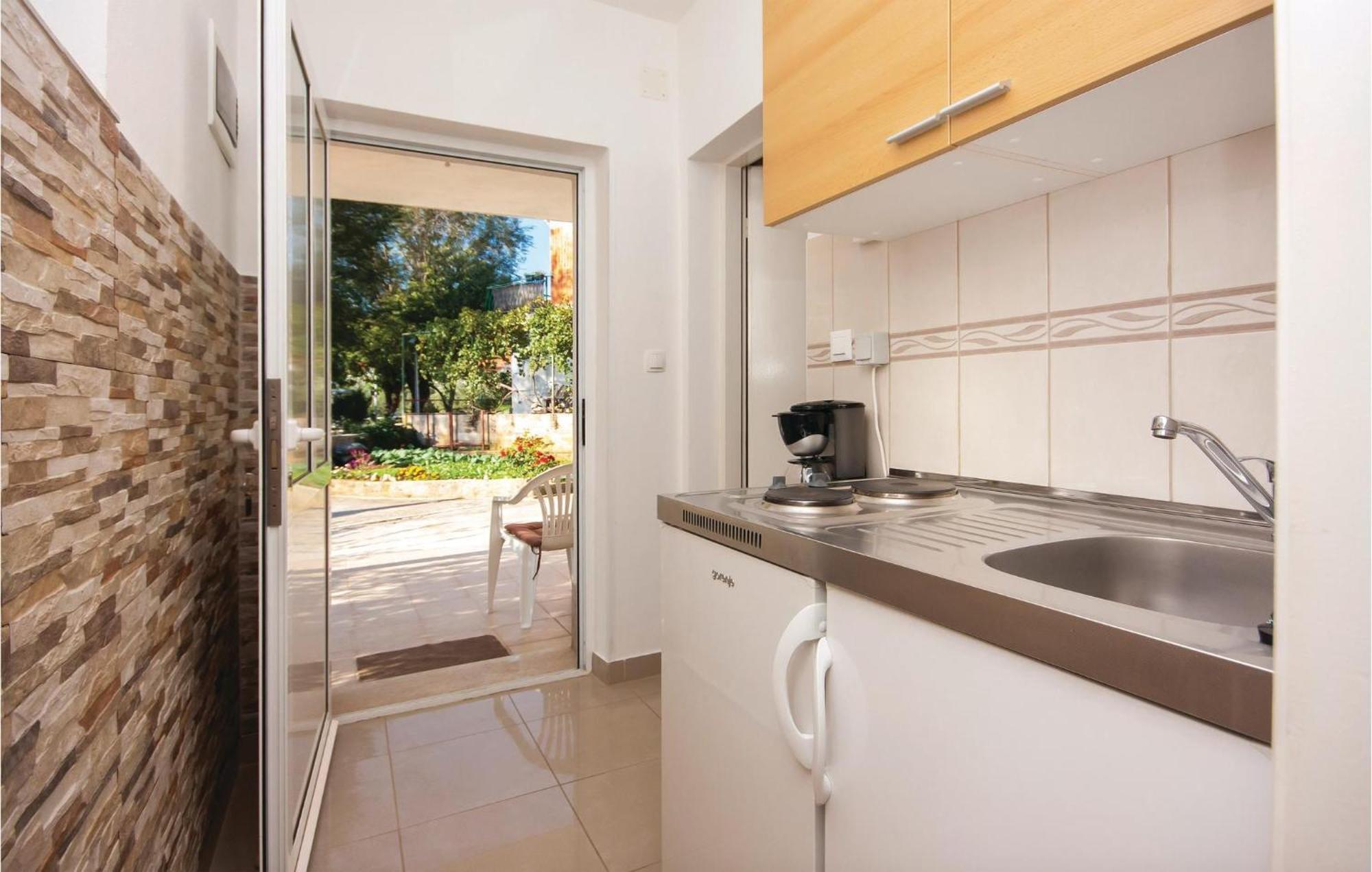 Nice Apartment In Raslina With House Sea View Dış mekan fotoğraf